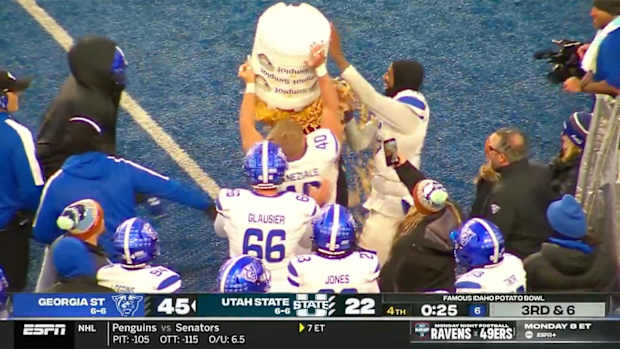 Georgia State players douse their coach in french fries.